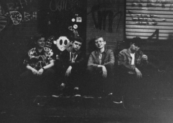 paper/boy photo by betsy bailie